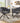 Chaise grise en velours haut de gamme style luxe léger et moderne avec pieds réglables en métal en forme de griffe, idéale pour salle à manger ou coiffeuse